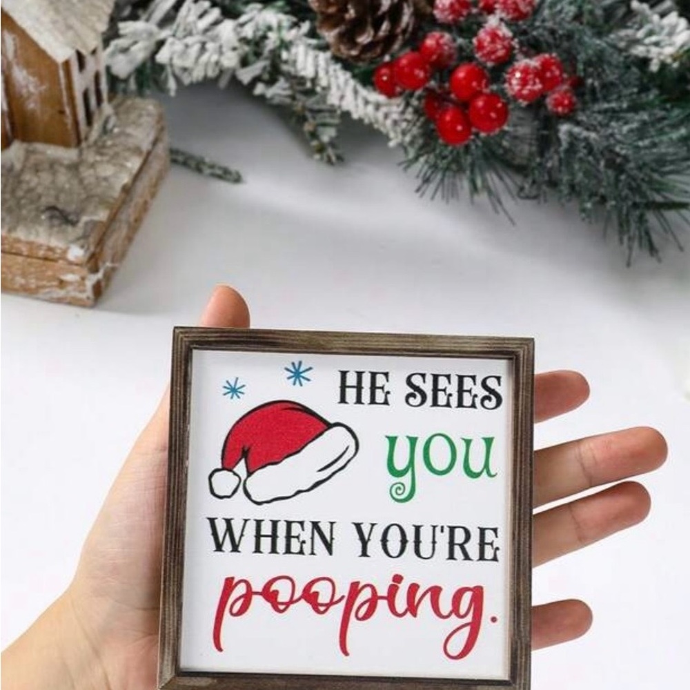 Festive Holiday Sign with Santa Hat Design